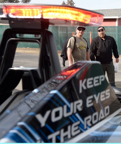 Decal reads, "Keep Your Eyes on the Road."